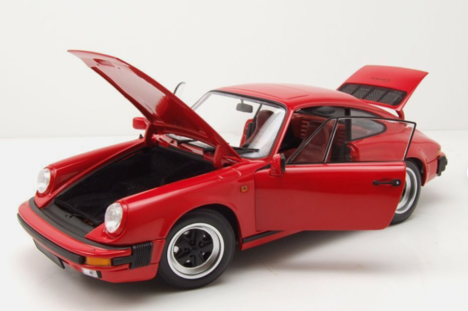 PORSCHE 911 CARRERA COUPÉ 3.2 - 1983 ROUGE MINICHAMPS 1/18