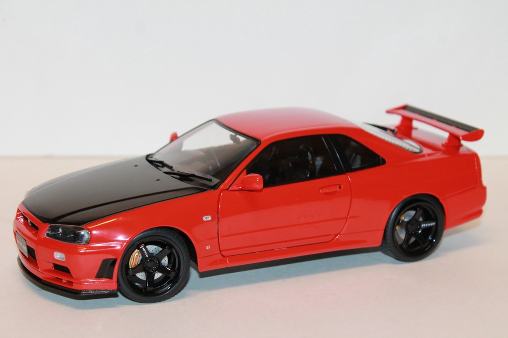 NISSAN R34 GTR 1999 ROUGE SOLIDO 1/18°