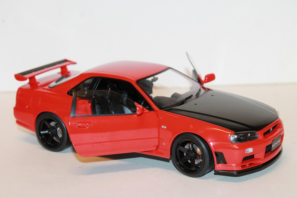 NISSAN R34 GTR 1999 ROUGE SOLIDO 1/18°